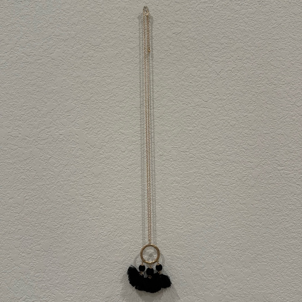 Long gold and black necklace